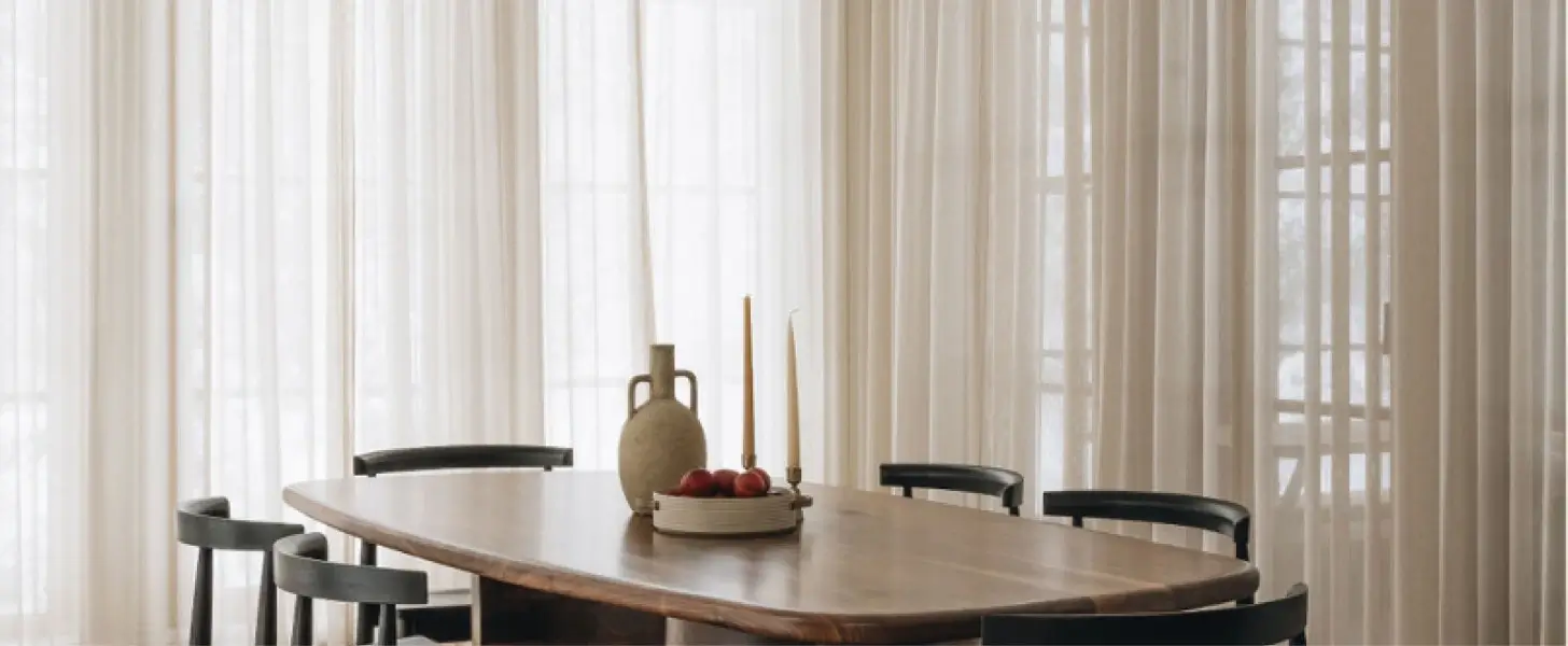 Sophisticated dining room featuring a handcrafted live edge table in Ottawa with minimalist décor.